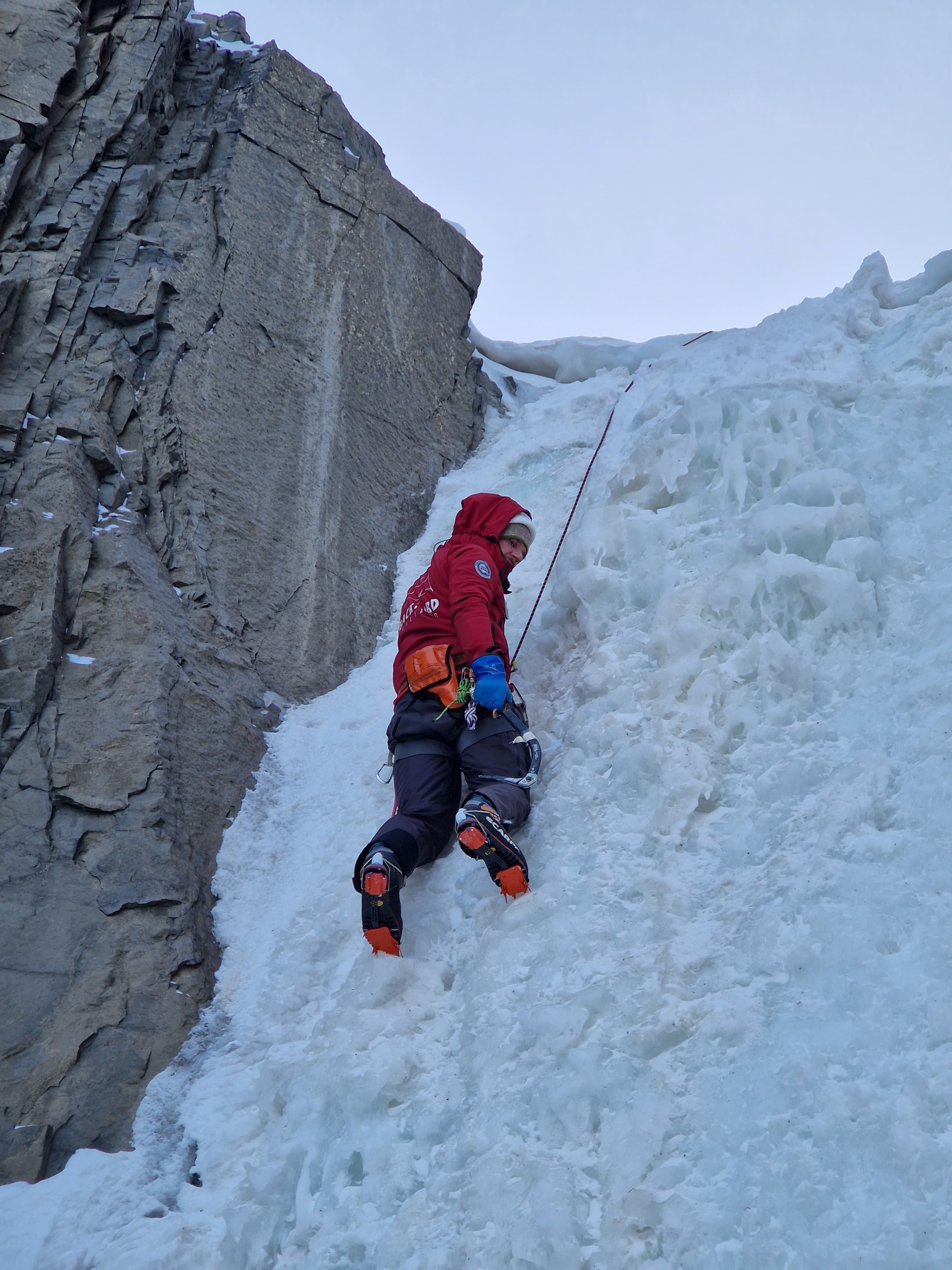 Ice climbing and snowmobile tour - Backyard Svalbard - Caving in