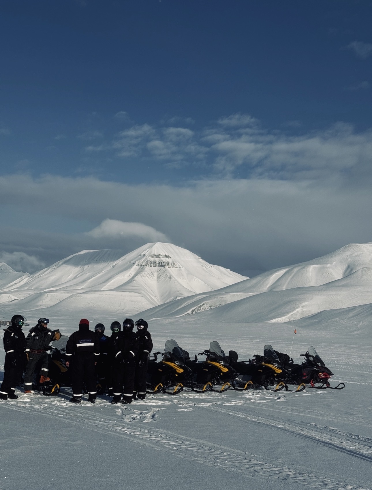 Polar Night Snowmobile Adventure to a Frozen Waterfall